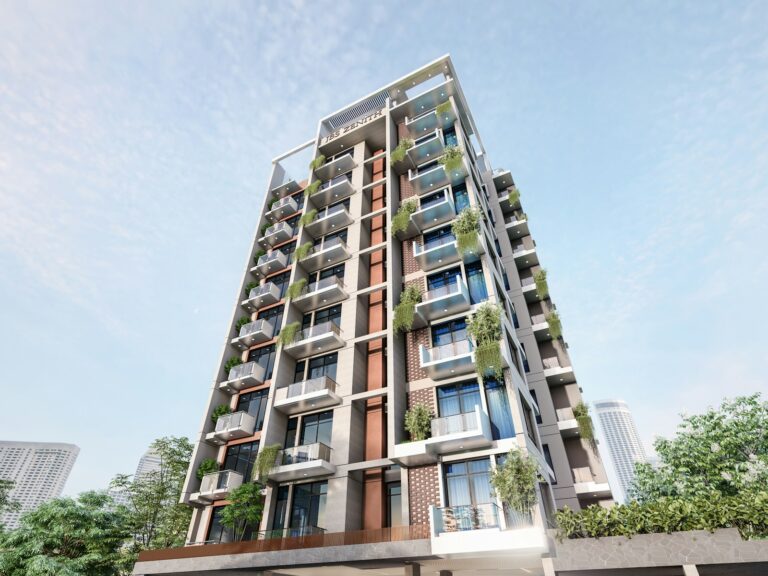 Modern apartment building with balconies and greenery.